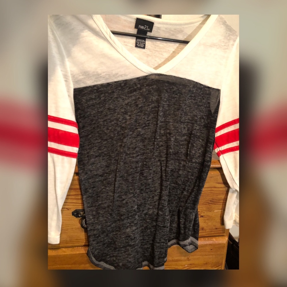 2 shirts both never worn.